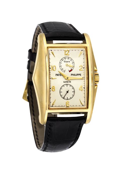 Patek Philippe. A fine and rare 18K gold rectangular wristwatch 